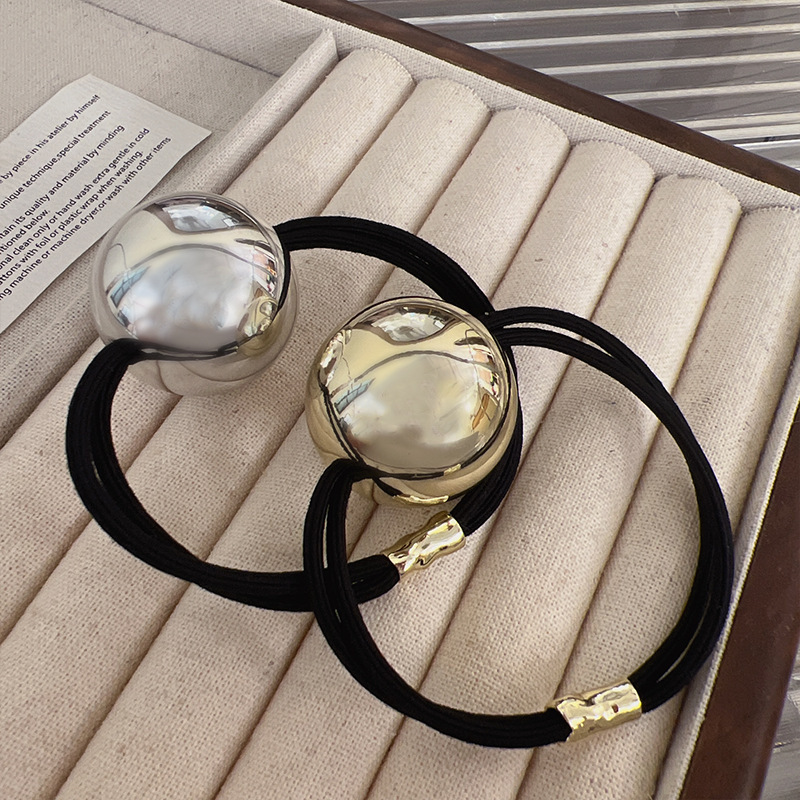 Metal ball hair ring back of t - Home Office Head recension och pris